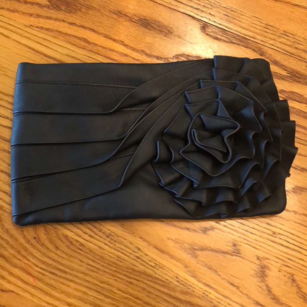Big Buddha Black wristlet. Great Condition!